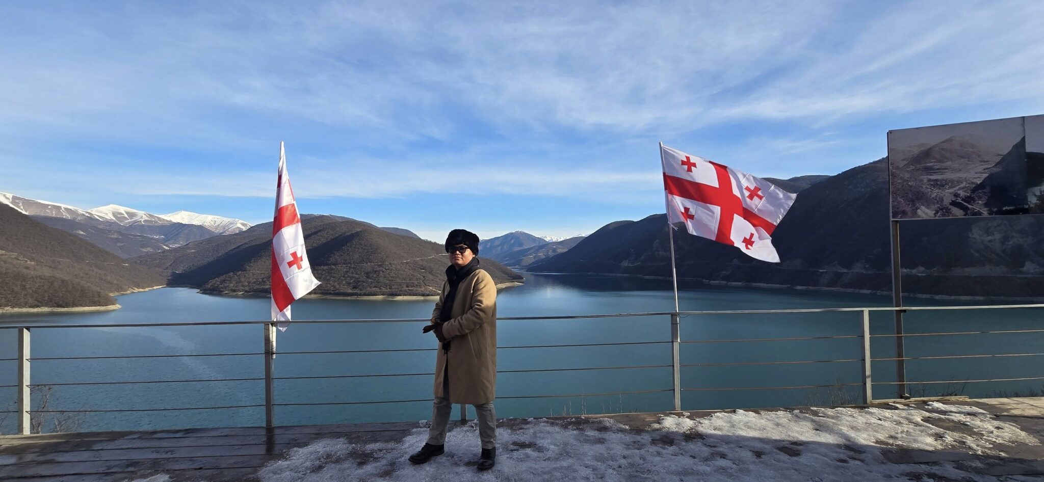 Lake views and the Georgia flag waving proudly—yes, I’m here soaking it all in.
